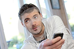 Young man talking on smartphone