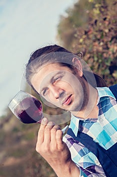 Young Man Tasting Wine
