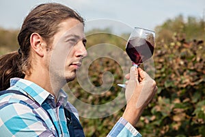 Young Man Tasting Wine