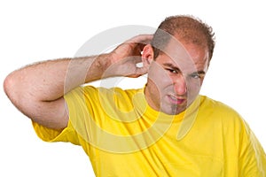 Young man tear at one's hair photo