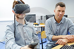 young man in technology lab using virtual reality headset