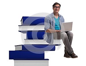 Young man in telelearning concept with laptop and books