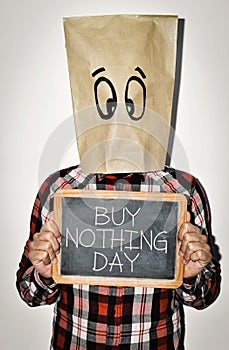 Young man and text buy nothing day