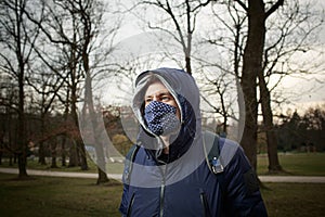 Young man with the textil mask photo