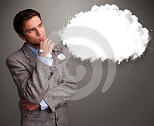 Young man thinking about cloud speech or thought bubble with cop