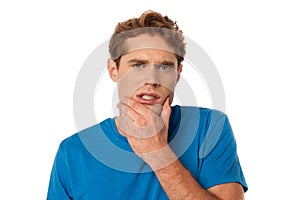 Young man thinking something