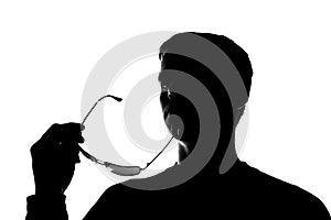 The young man thought holding the glasses