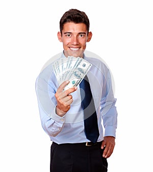 Young man in tie holding cash dollars