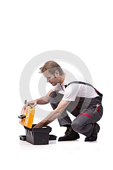 The young man with toolkit toolbox isolated on white