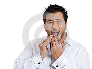 Young man with tooth ache