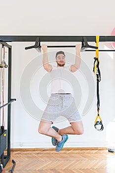 young man training at the gym