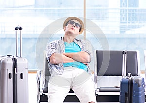 Young man travelling for his summer beach vacation