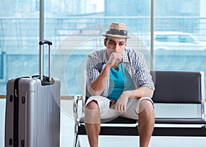 Young man travelling for his summer beach vacation