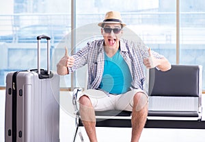 Young man travelling for his summer beach vacation