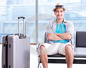 Young man travelling for his summer beach vacation