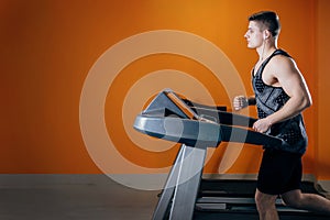 Young man on the treadmill