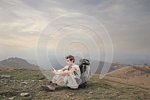 Young man trekking in the mountains