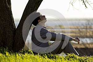 Young man turns to God with hope, the concept of faith and spirituality photo