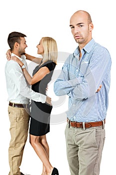 Young man unhappy jealous couple behind