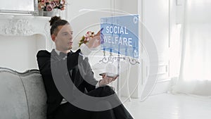 Young man uses hologram Social welfare