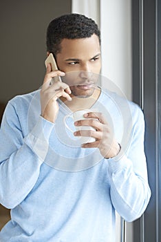 Young man using cellphone