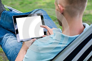 Young Man Using Digital Tablet