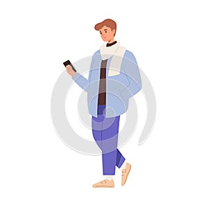 Young man using mobile phone on go. Person walking with smartphone in hand outdoors. Guy strolling and surfing internet