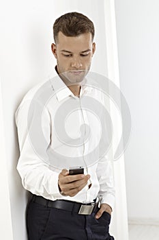 Young man using mobilephone