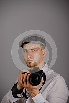 Young man using a professional camera