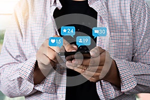 Young man using smart phone Social media and social network Mark