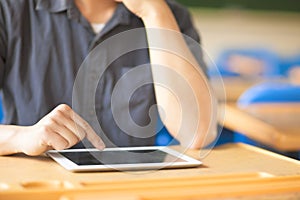 Young man using a tablet or ipad