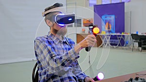 Young man using virtual reality glasses. VR