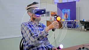 Young man using virtual reality glasses. VR photo
