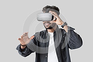 Young man using virtual reality headset. VR, future, gadgets, technology, education online, studying concept