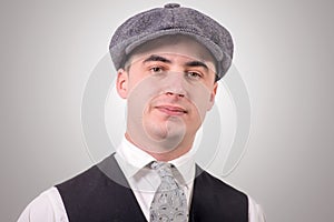 Young man in vintage clothes with hat, 1940 style