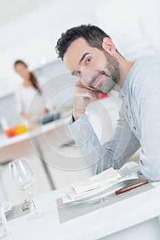 Young man waiting for dish