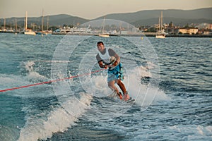 Young man wakeboarding