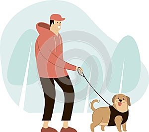 Young Man walking with a dog in the park
