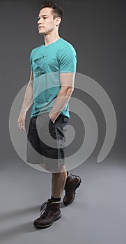 Young Man Walking In Shorts