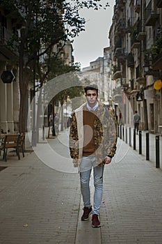 Young man walking on the street