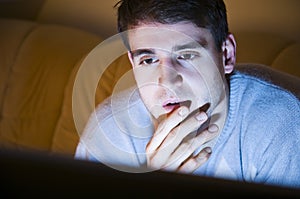 Young man watching television
