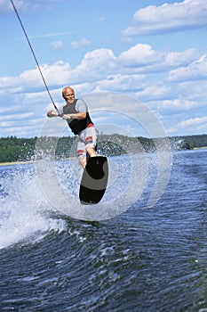 A young man water skiing