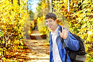 Young man wave goodbye