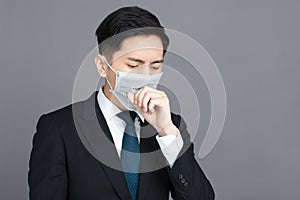 Young man wear medical mask and  cough