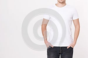 Young man wearing blank white t-shirt isolated on white background. Copy space. Place for advertisement