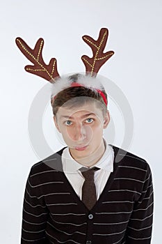 Young man wearing deer's horns