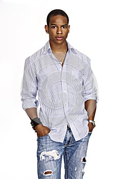 Young man wearing dress shirt and jeans