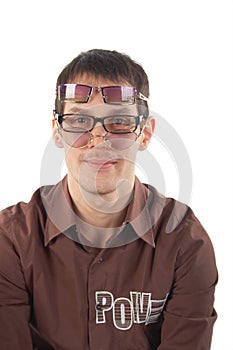 Young man wearing three glasses