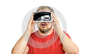 Young man wearing virtual reality googles / VR Glasses