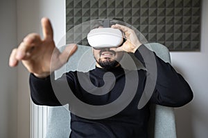 Young man wearing VR Goggles